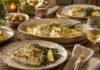 Flaky baked cod topped with creamy herb cheese and parsley