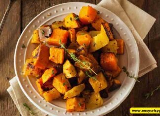 crispy roasted autumn root vegetables in a warm bowl